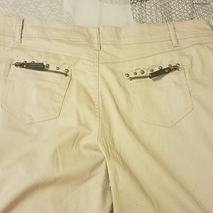 Khaki Bermuda shorts.